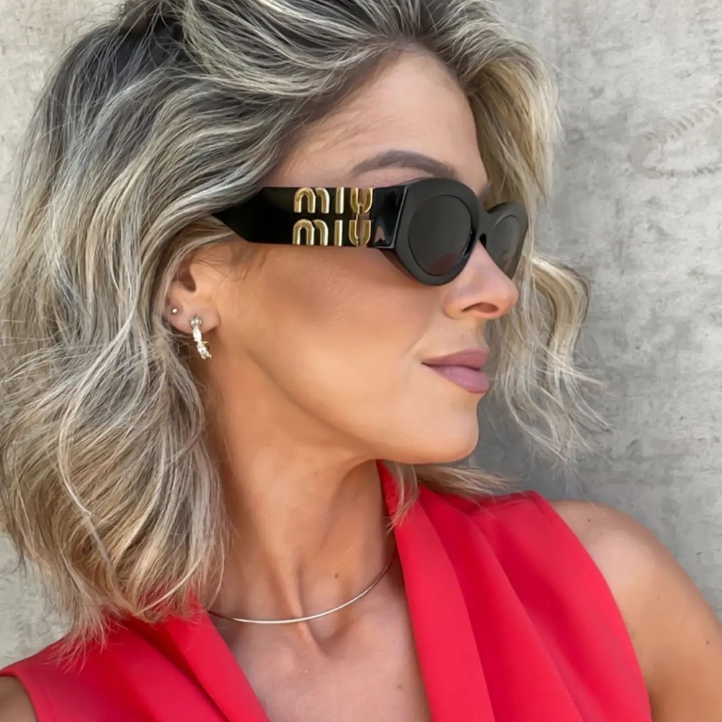 Miu Miu Cat Eye Sunglasses with Logo